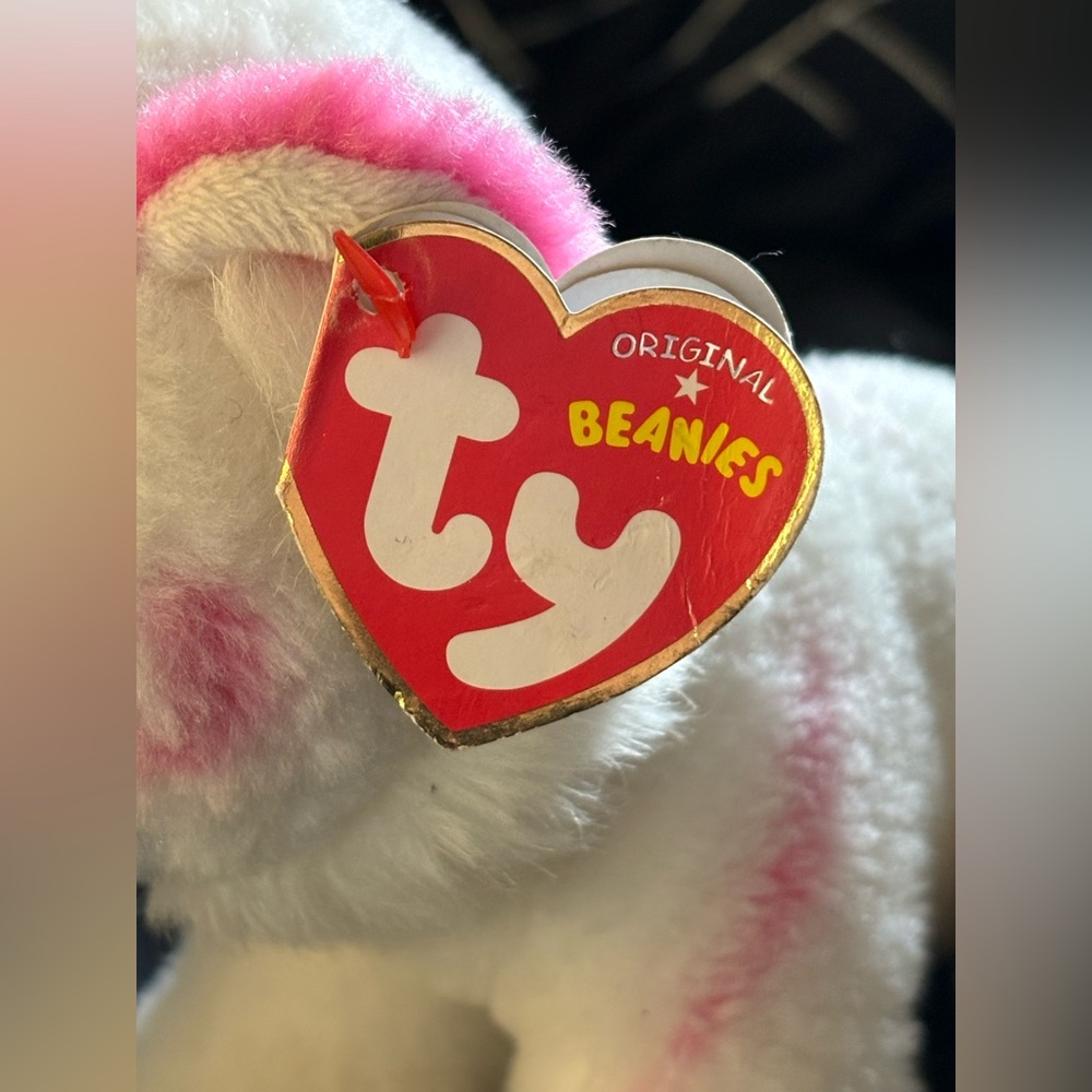 a pair of Ty Beanie Boos, including Nelly the grey koala and Tabor the tiger.